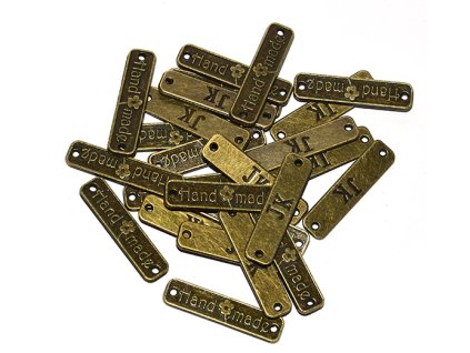 Našívací kovová značka 25x6 mm HAND MADE 1