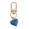 Carabiner with heart pendant