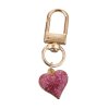 Carabiner with heart pendant