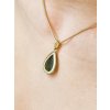 Gold pendant with Moldavite in the shape of a drop P2000225860005