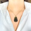 Moldavite pendant in gold with garnet 2000092280005
