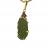 Moldavite pendant in gold with garnet 2000168870000