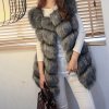 Vesta kožúšok zimné dámsky s koženkovými vreckami teplá umelá kožušina (s-4XL) AFASHION AF18048