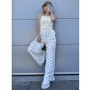 Dámský overál s puntíky