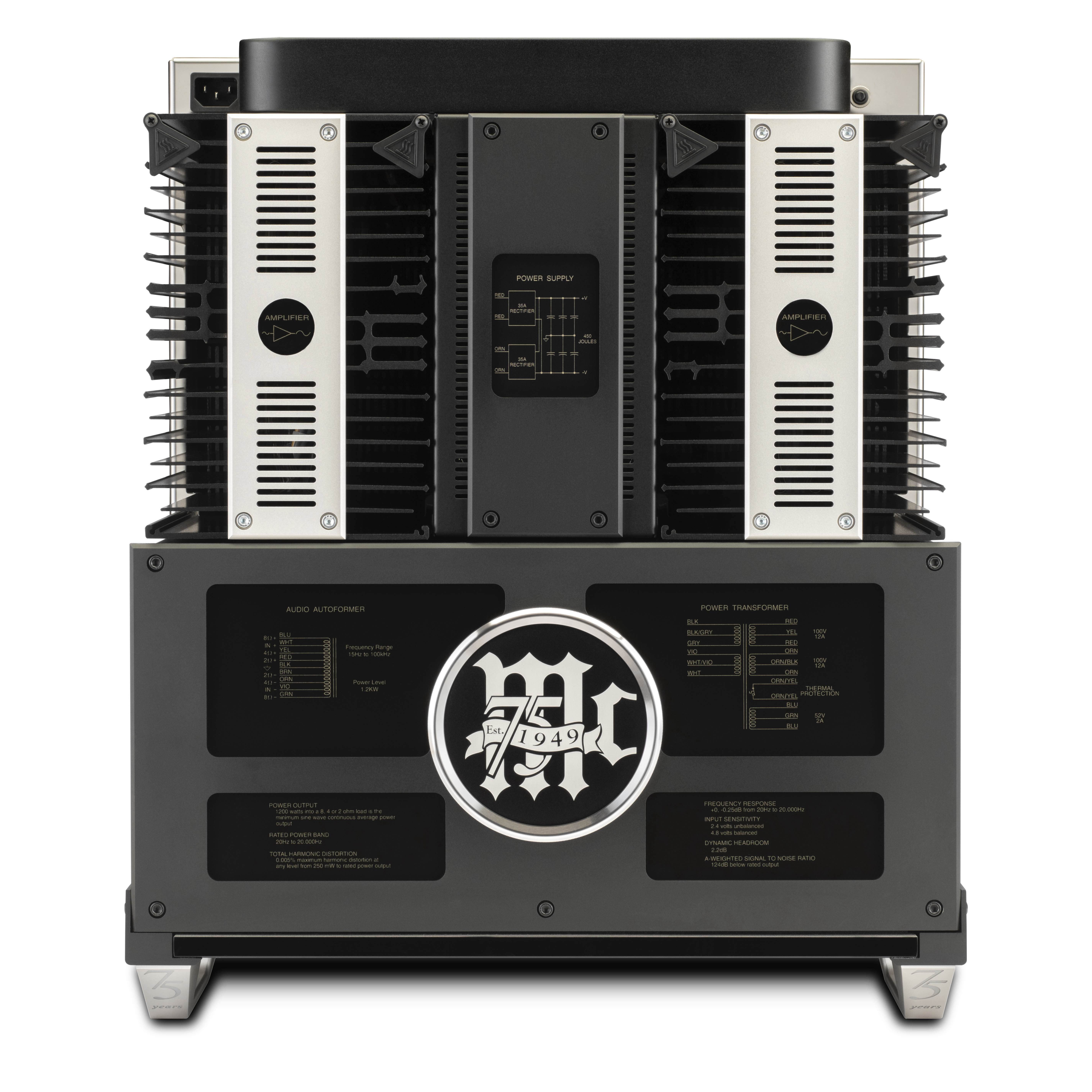 Horní strana McIntosh MC1.25KW 75. Anniversary s kruhovým výročním štítkem mezi skleněnými kryty transformátorů