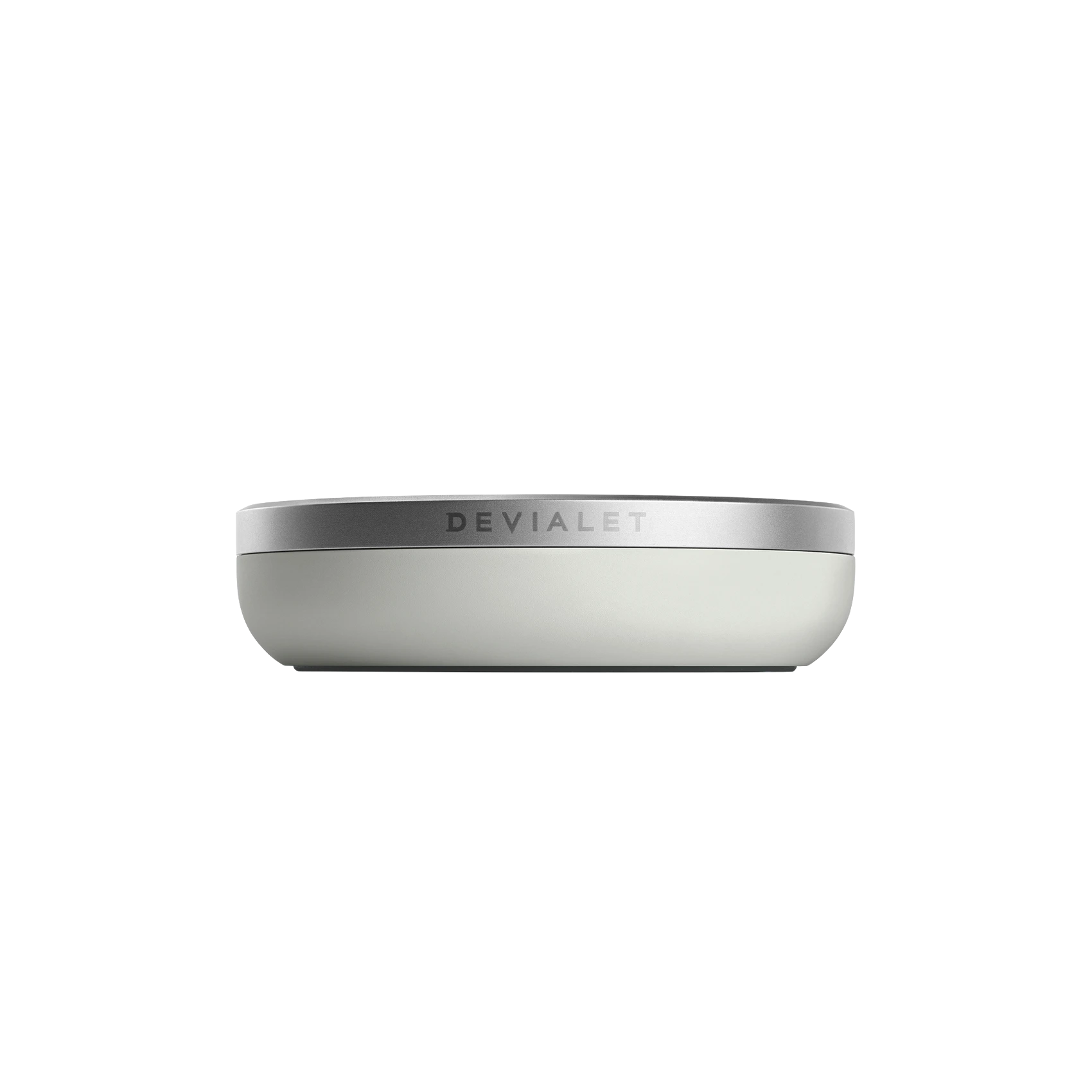 Devialet Remote Ultimate Light Pearl na konferenčním stolku