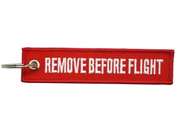 MegaKey - přívěsek REMOVE BEFORE FLIGHT - oboustranný, vyšívaný, 13 x 3 cm