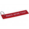 přívěšek na klíče REMOVE BEFORE FLIGHT červený