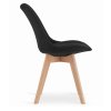 Stylová černá jídelní židle DAREN NORI s čalouněným sedákem a dřevěnými nohami.