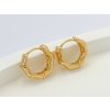 Zlaté kruhové náušnice inspirované bambusovým designem s pozlacením 18K, elegantní a moderní vzhled.