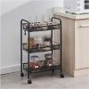 Černá kovová pojízdná polička do koupelny se 3 policemi a kolečky