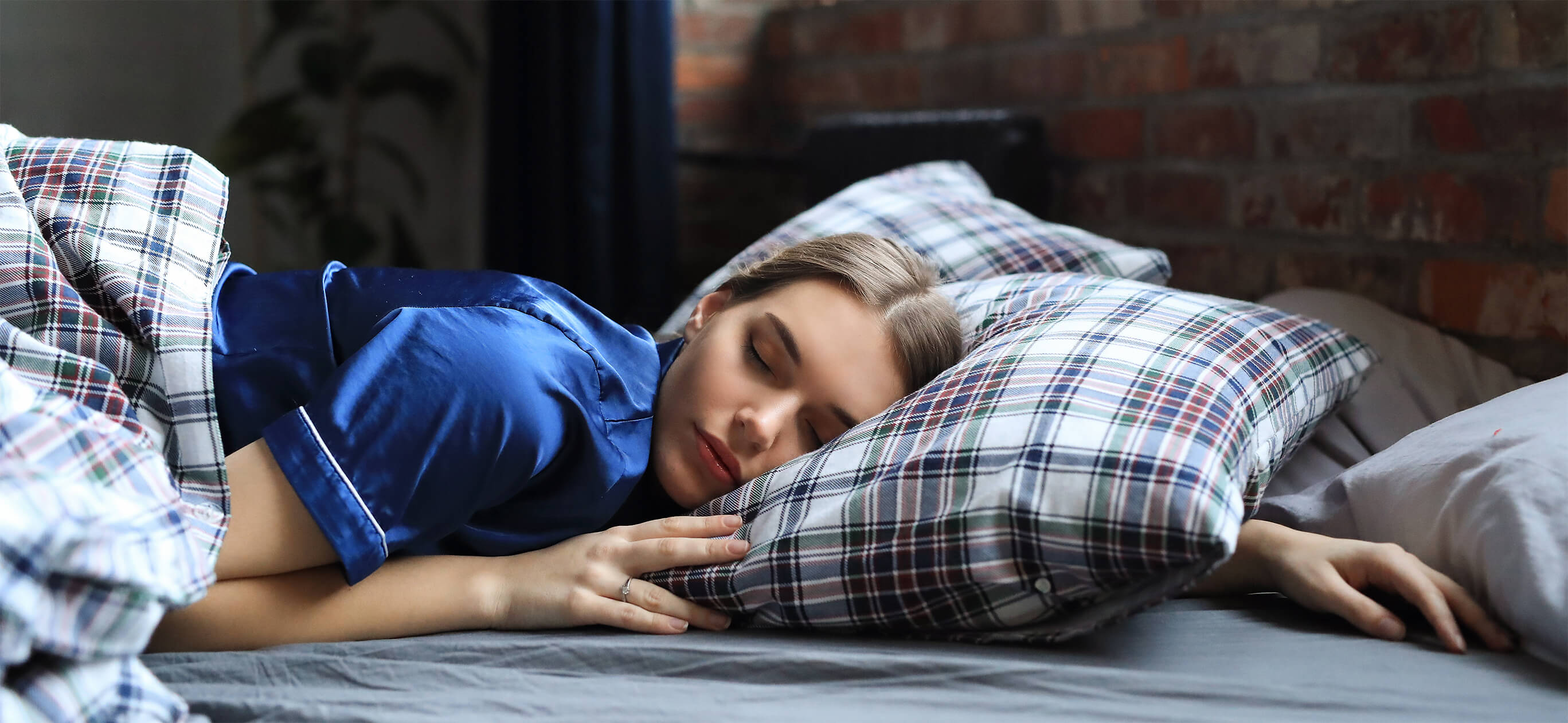 young-woman-sleeping-bed