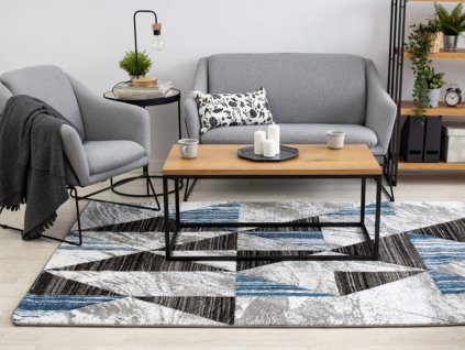 Koberec Nano v sivo-modrom dizajne.