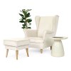 Krémové kreslo ušiak s taburetom Dory s doplnkami