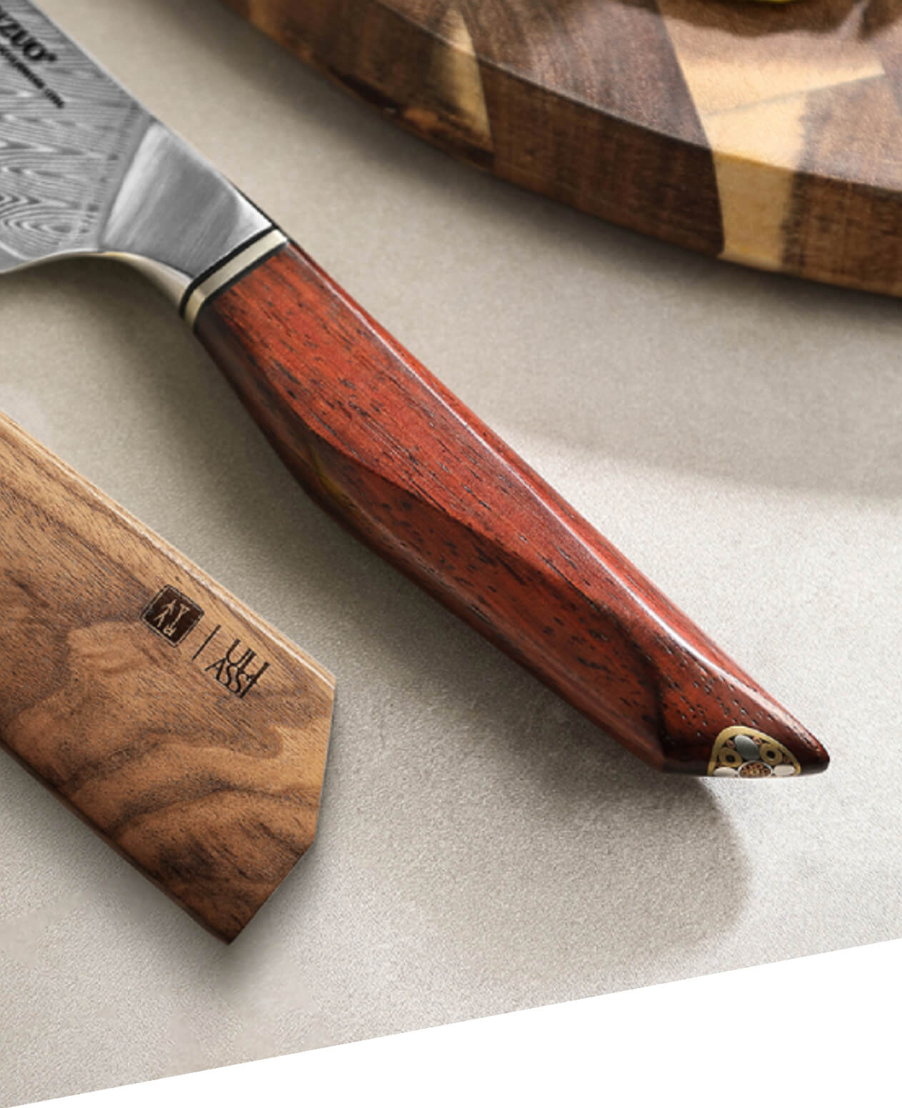 Der Griff des Kochmessers Bunka XinZuo Xing X03 aus Palisanderholz