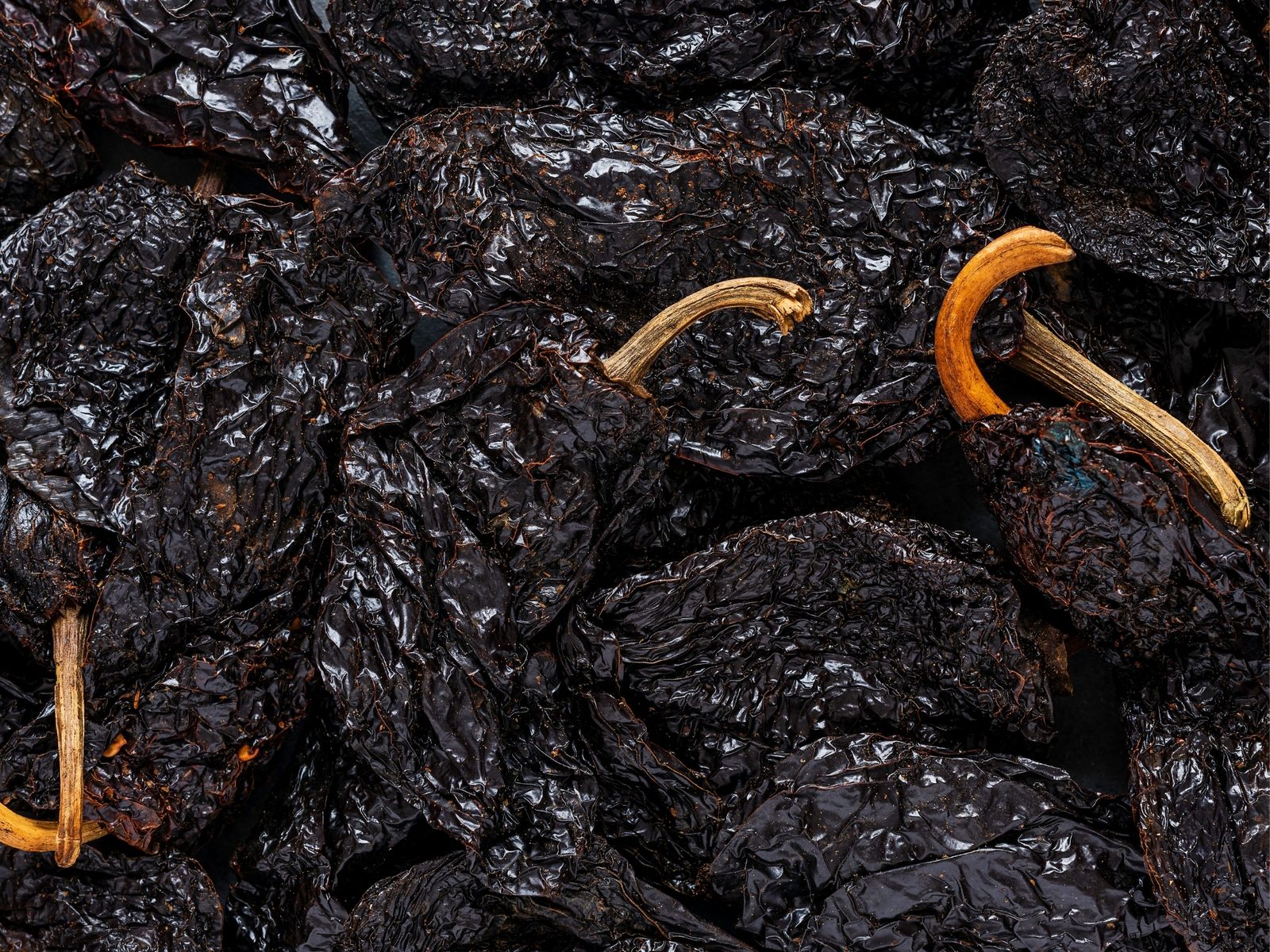 Drvené ancho chilli, tmavočervené vločky so semienkami