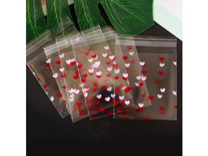 Celofánové sáčky s lepící klopou motiv srdíček červených a růžových transparentní 10x10 cm
