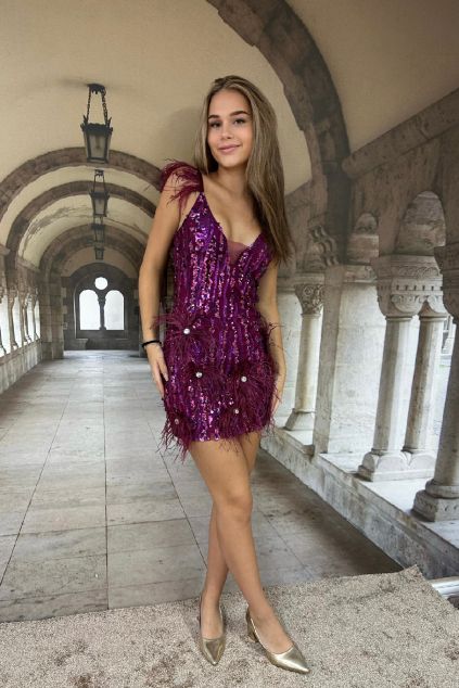 Šaty El