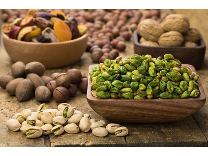 pistachios nuts peeled green square bowl isolated white background organic food top view (1)