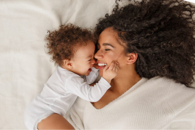 woman-with-her-baby-664x443