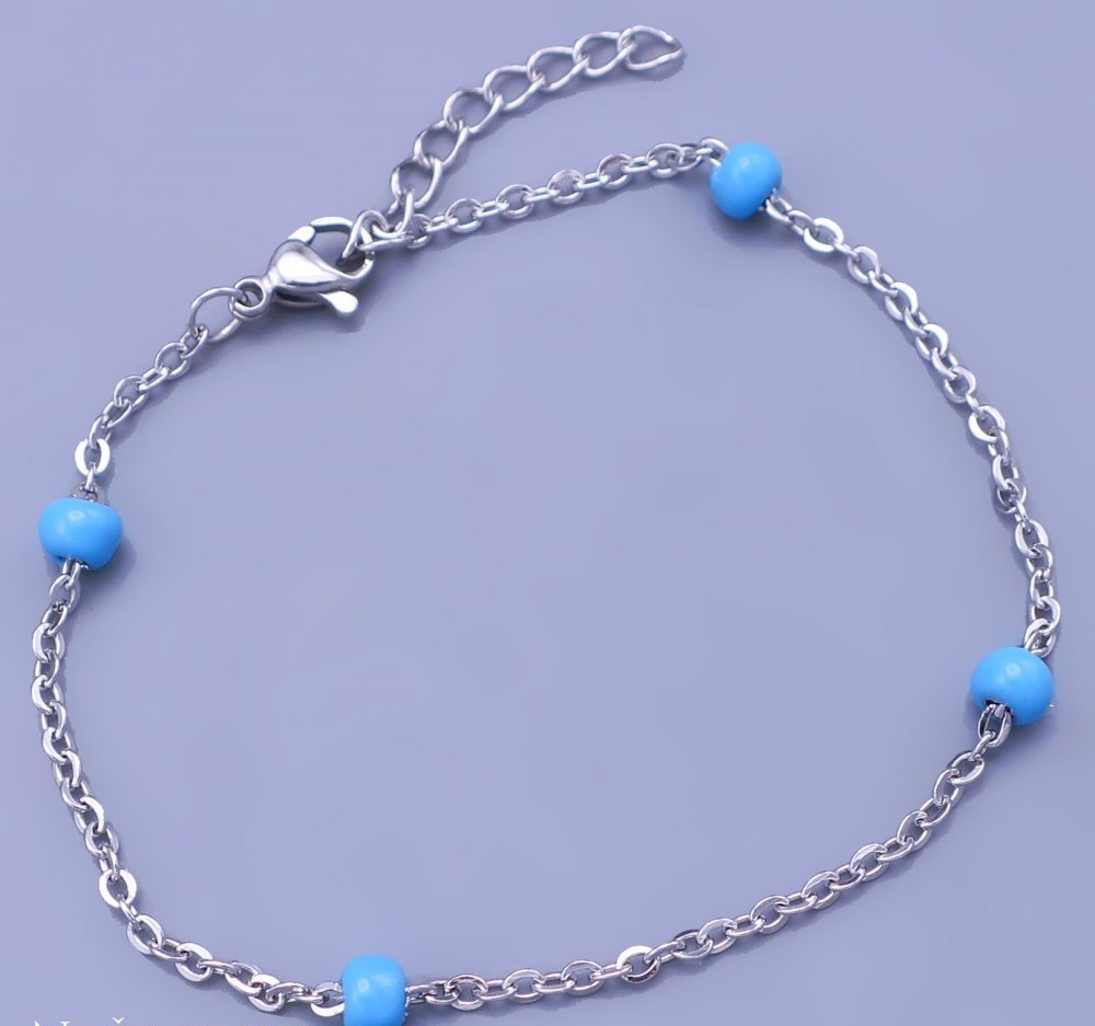 Náramek z chirurgické oceli s modrými perličkami