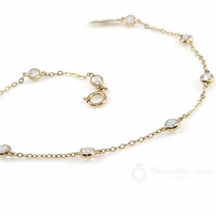 Zlatý náramek s bílými kameny