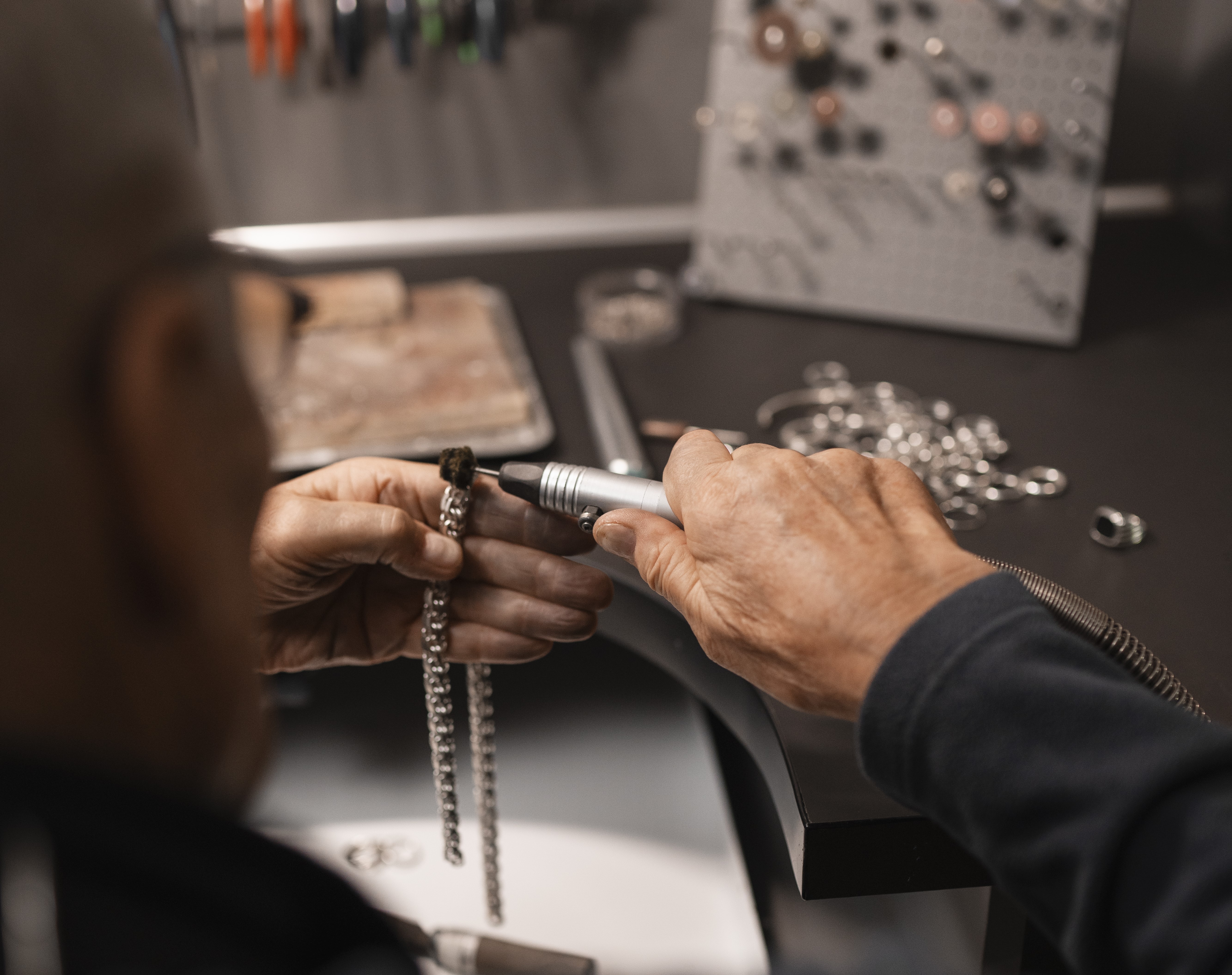 male-jeweler-working-shop