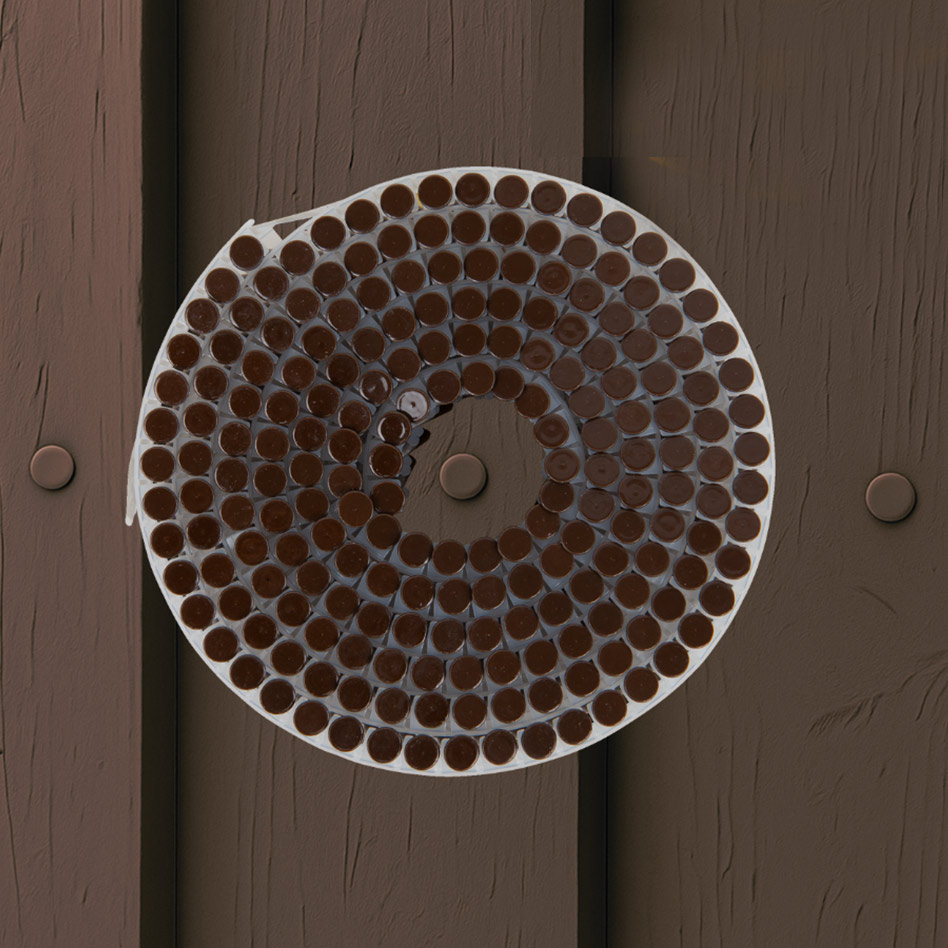 Detail hlavičky skrutky v hnedom odtieni