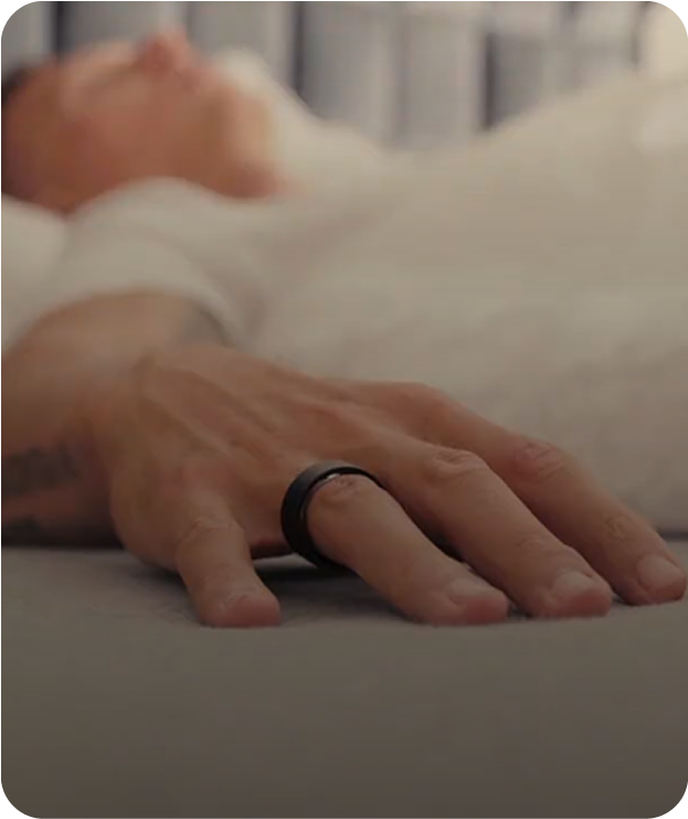 Man checking Oura app at start of his day